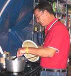 Gary Reid, cooking gumbo.
